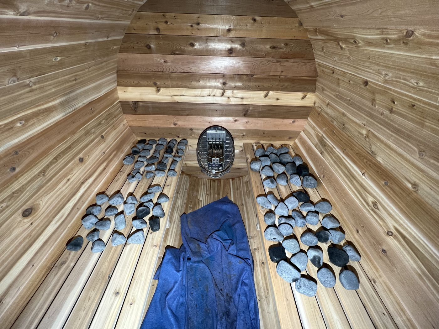 Sauna in the snow with string lights