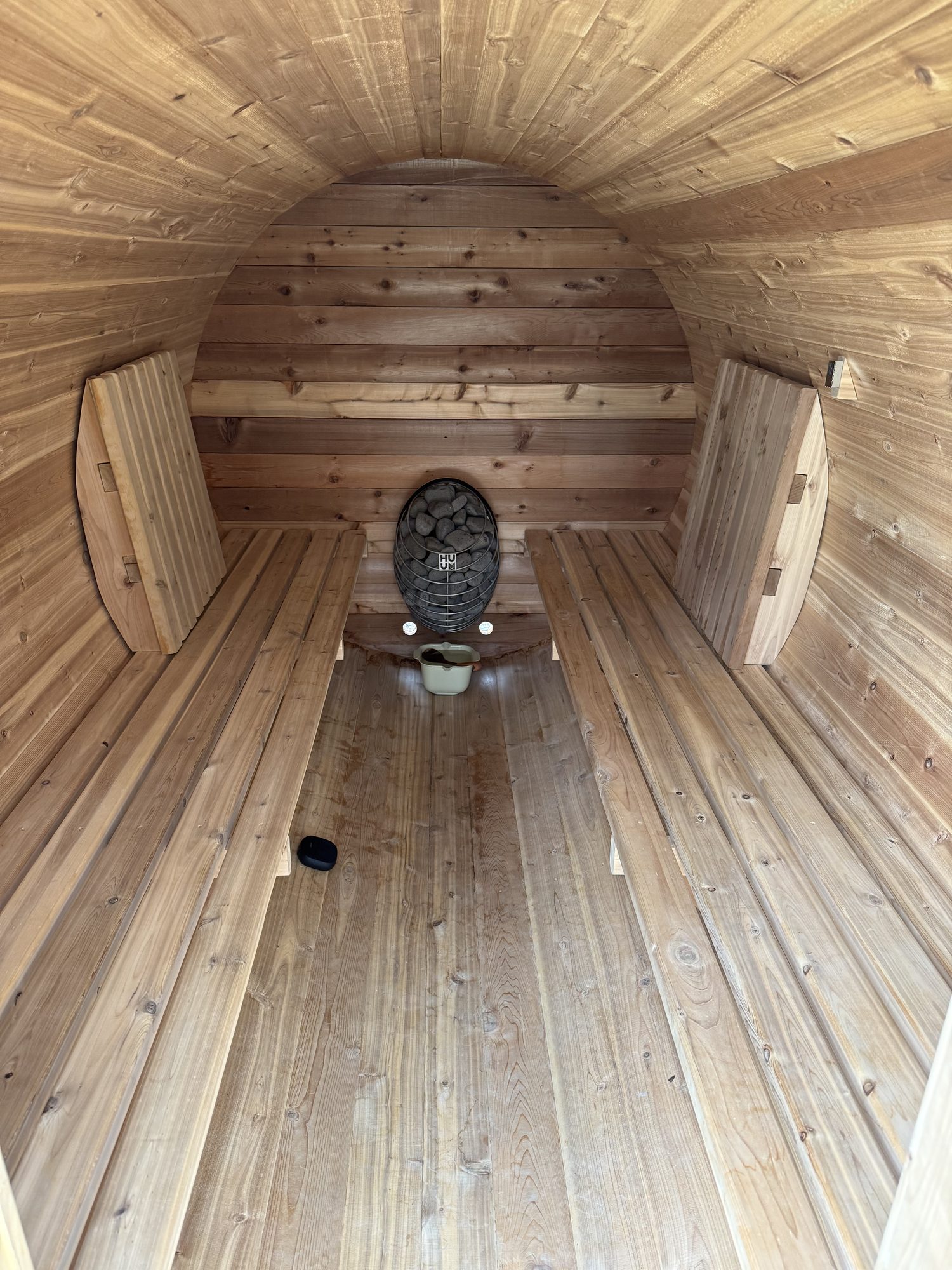 Inside the cedar barrel sauna